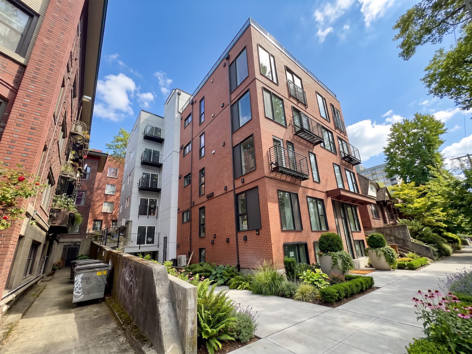 The brick exterior of Thirteen East on 14th Avenue East